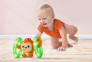 Juguete Mono Gira y Brilla Roll & Glow Monkey