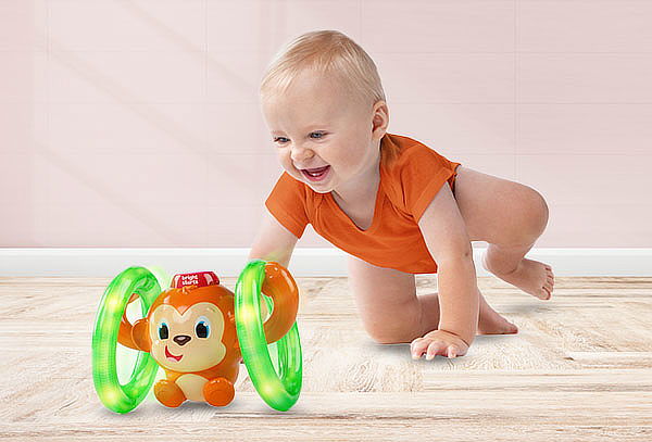 Juguete Mono Gira y Brilla Roll & Glow Monkey