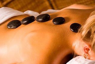 Masaje Descontracturante + Relajación con Piedras Calientes