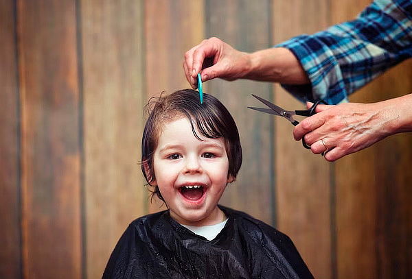 $12.990 por Corte de pelo niño/niña en Estilo Kids