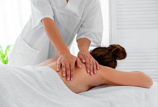 Sesión de masaje descontracturante en Vida Kenko spa, 