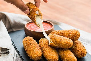Tony Roma's: 1 Aperitivo a elección + 2 Pisco Sour o Schop