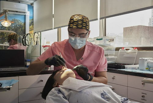 Limpieza dental + Terapia de Flúor + Evaluación  