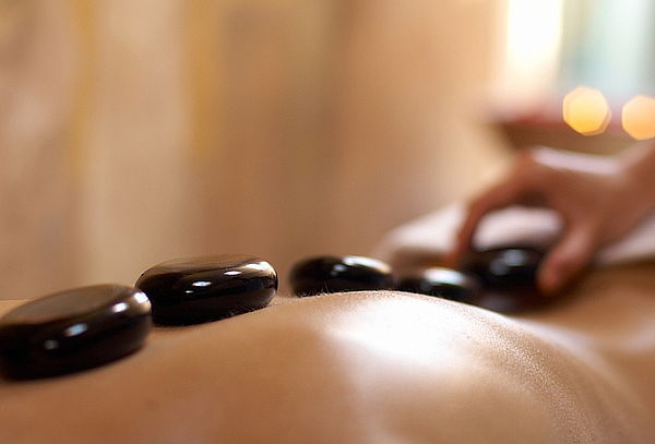 Masaje Descontracturante + Relajación con Piedras Calientes