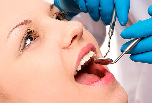 Limpieza Dental + Extracción de Cordales Erupcionadas