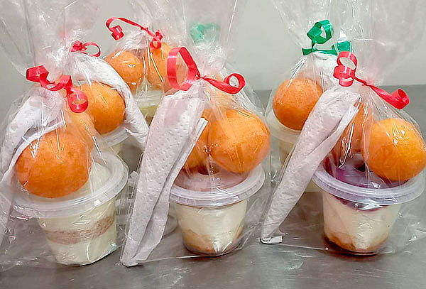 Bolsas Navideñas con Natilla o Arroz con Leche + 2 Buñuelos