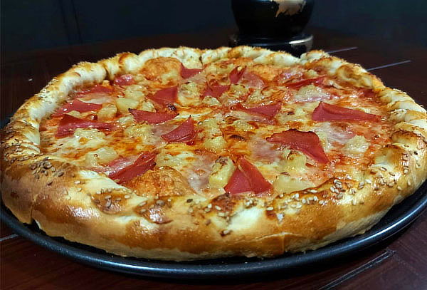 Pizza Familiar a Elegir + 5% de Descuento en Rollos 