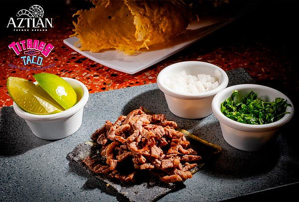 Frijoles charros + 2 Tacos en Titanes del Taco Parque AZTLÁN