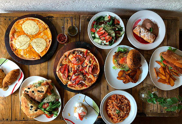 Hornería: Pizza Artesanal Grande + 2 Pastas + 2 | Cuponatic