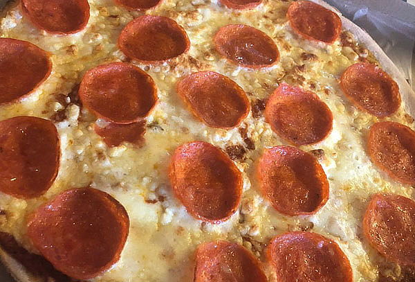 Hornería: Pizza Artesanal Grande + 2 Pastas + 2
