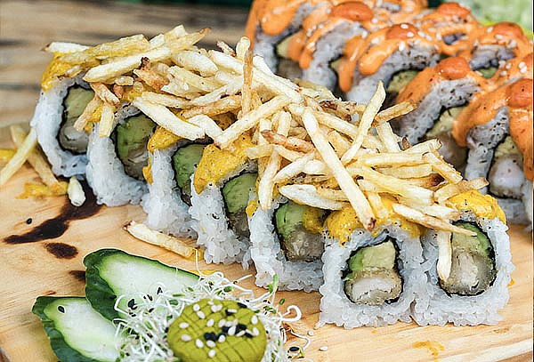 Barra libre de Makis +  4 Alitas 