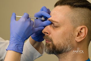 Toxina Botulínica 1 zona + Facial + Vitaminización