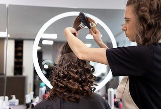 Realza tu belleza Corte + Lavado + Cepillado Rizados 